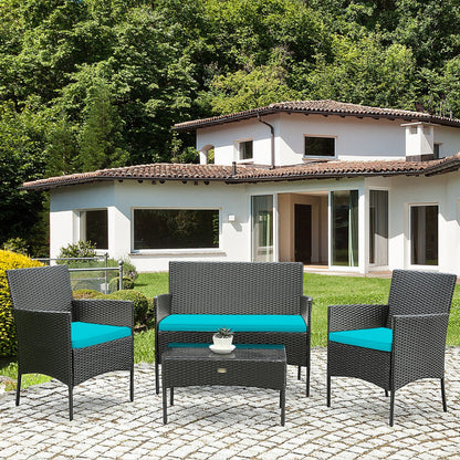 4-Piece Patio Rattan Cushioned Sofa Set with Tempered Glass Coffee Table