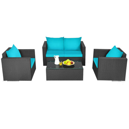 4-Piece Patio Rattan Conversation Set with Padded Cushion and Tempered Glass Coffee Table