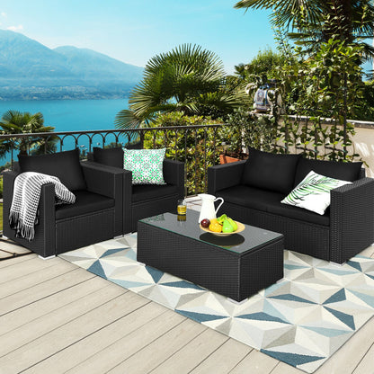 4-Piece Patio Rattan Conversation Set with Padded Cushion and Tempered Glass Coffee Table